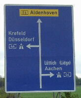 Autobahnhinweisschild - nach Aldenhoven, Krefeld, Düsseldorf, Lüttich und Aachen